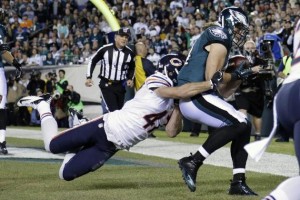 Riley Cooper catches a touchdown pass from Nick Foles during last night's game.